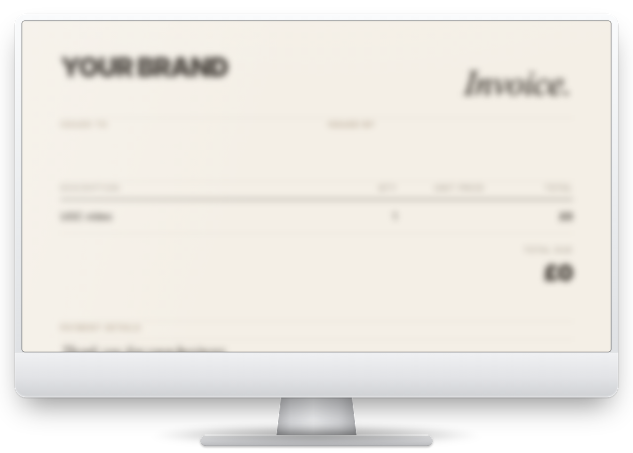The UGC invoice template shown on an iMac